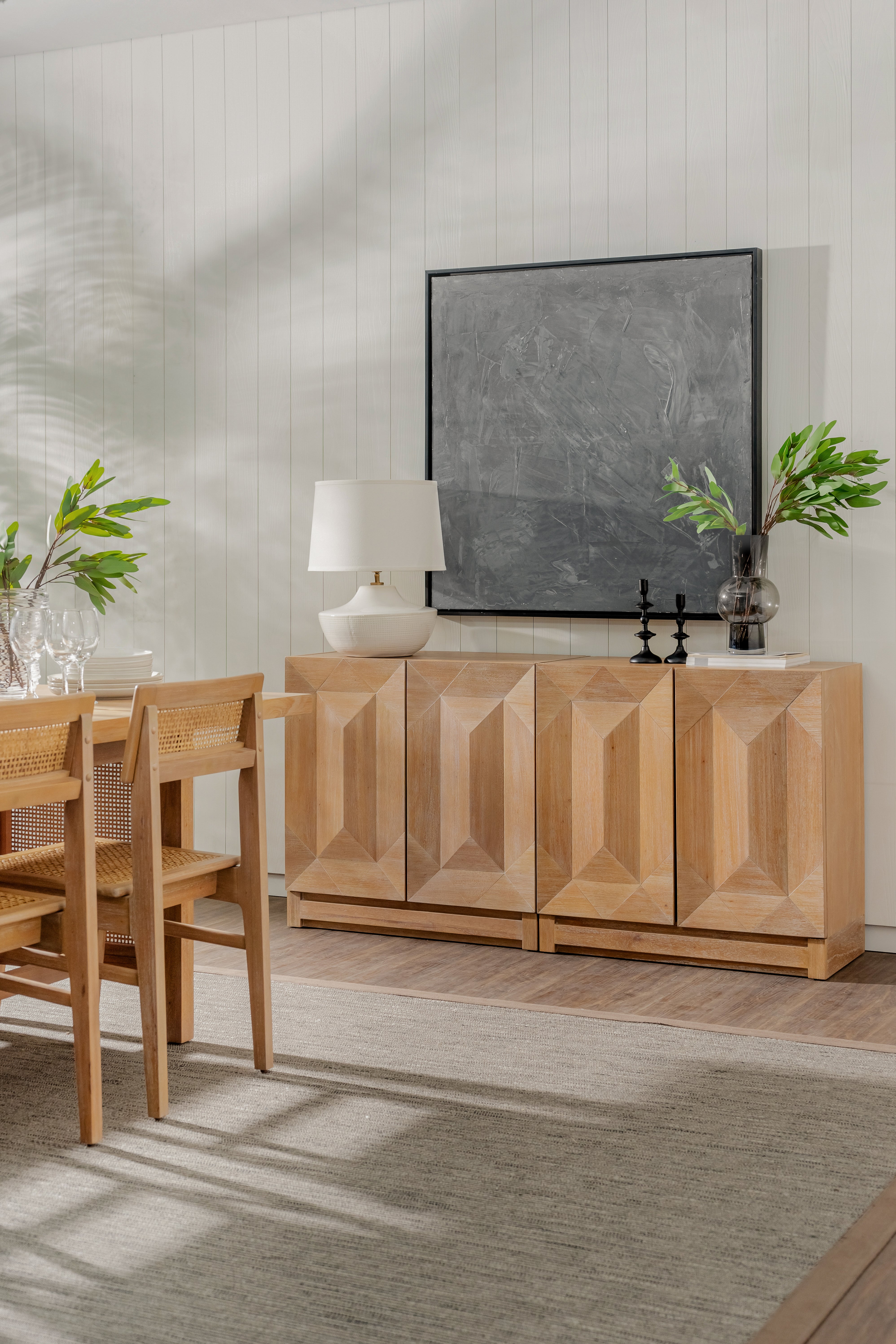 Natural Averi Modular Cabinet with decorative items in a living room setting
