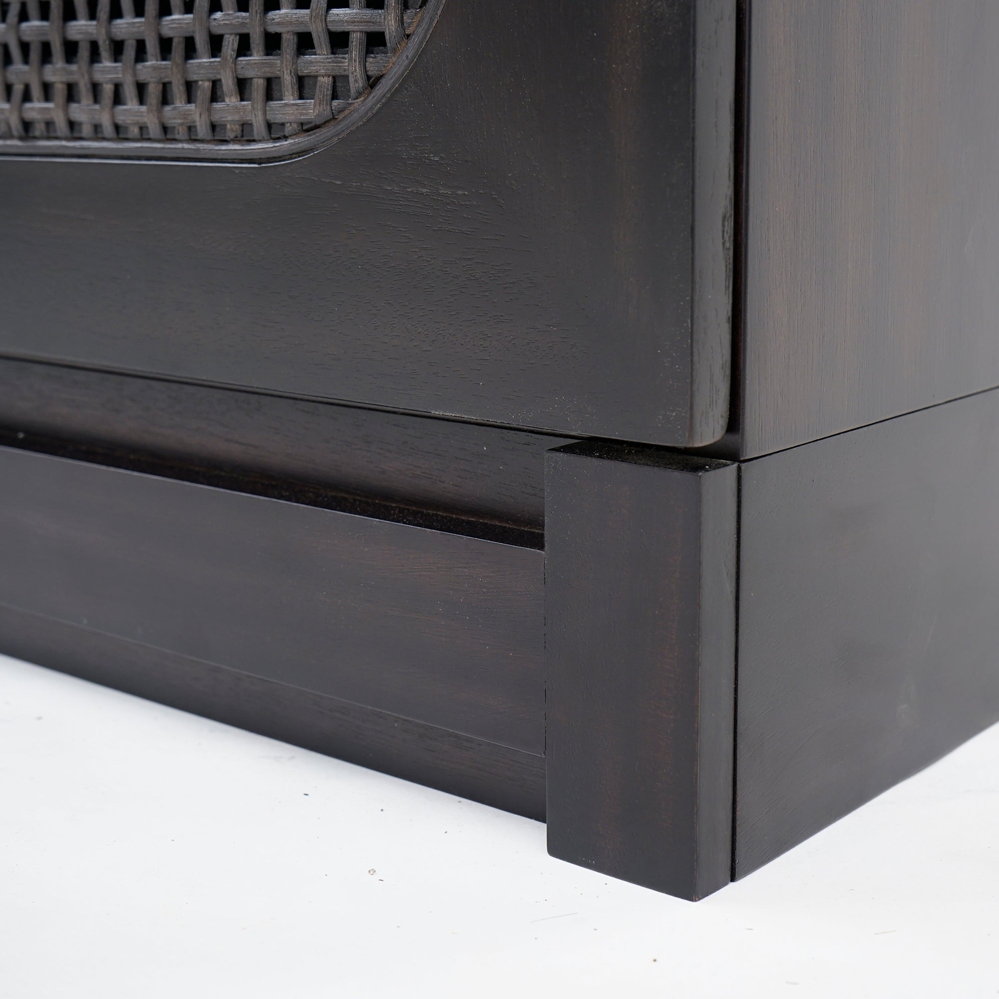 Close up leg of Black Liora 31.5 Rattan Modular Cabinet