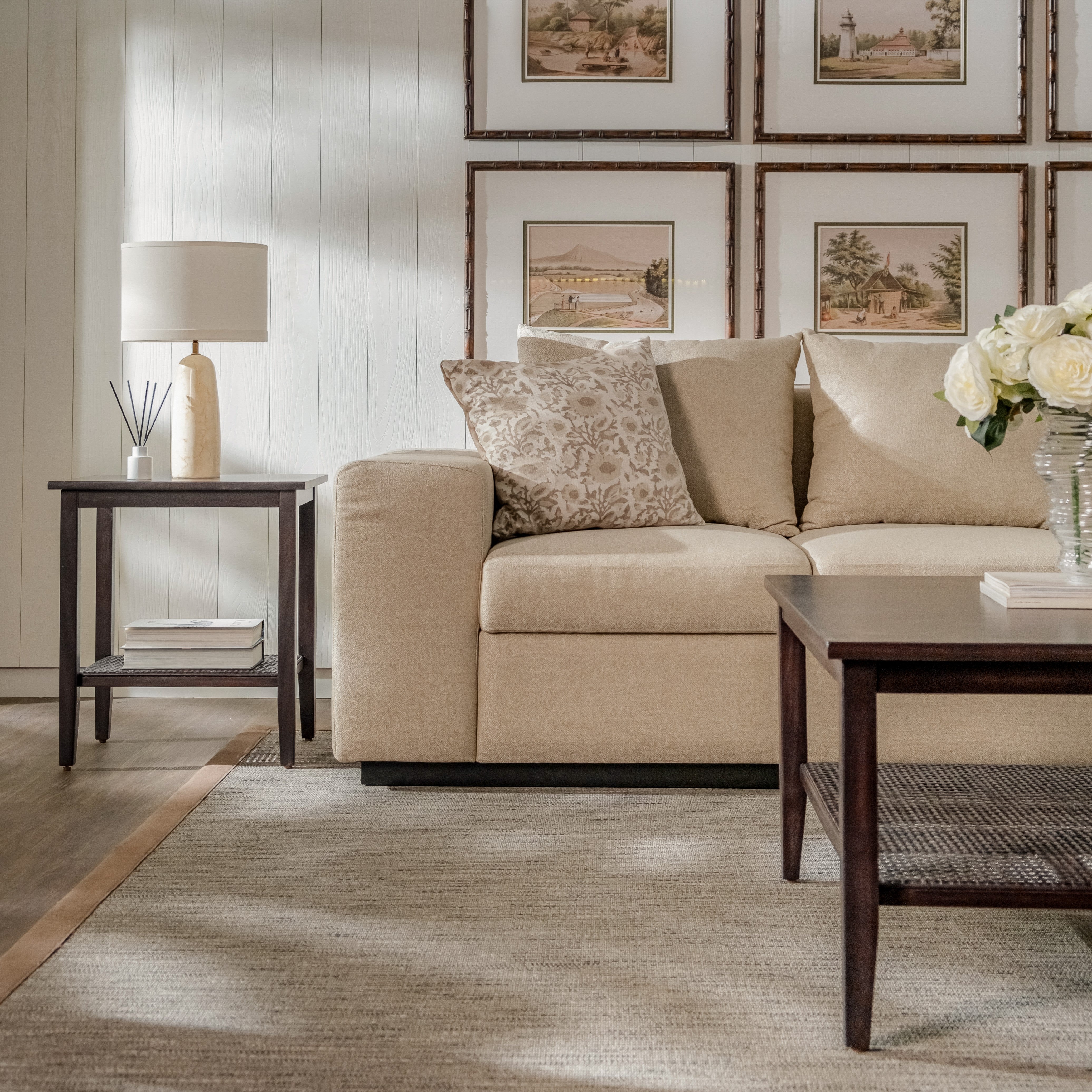 Living room with beige sofa, side table, and coffee table.
