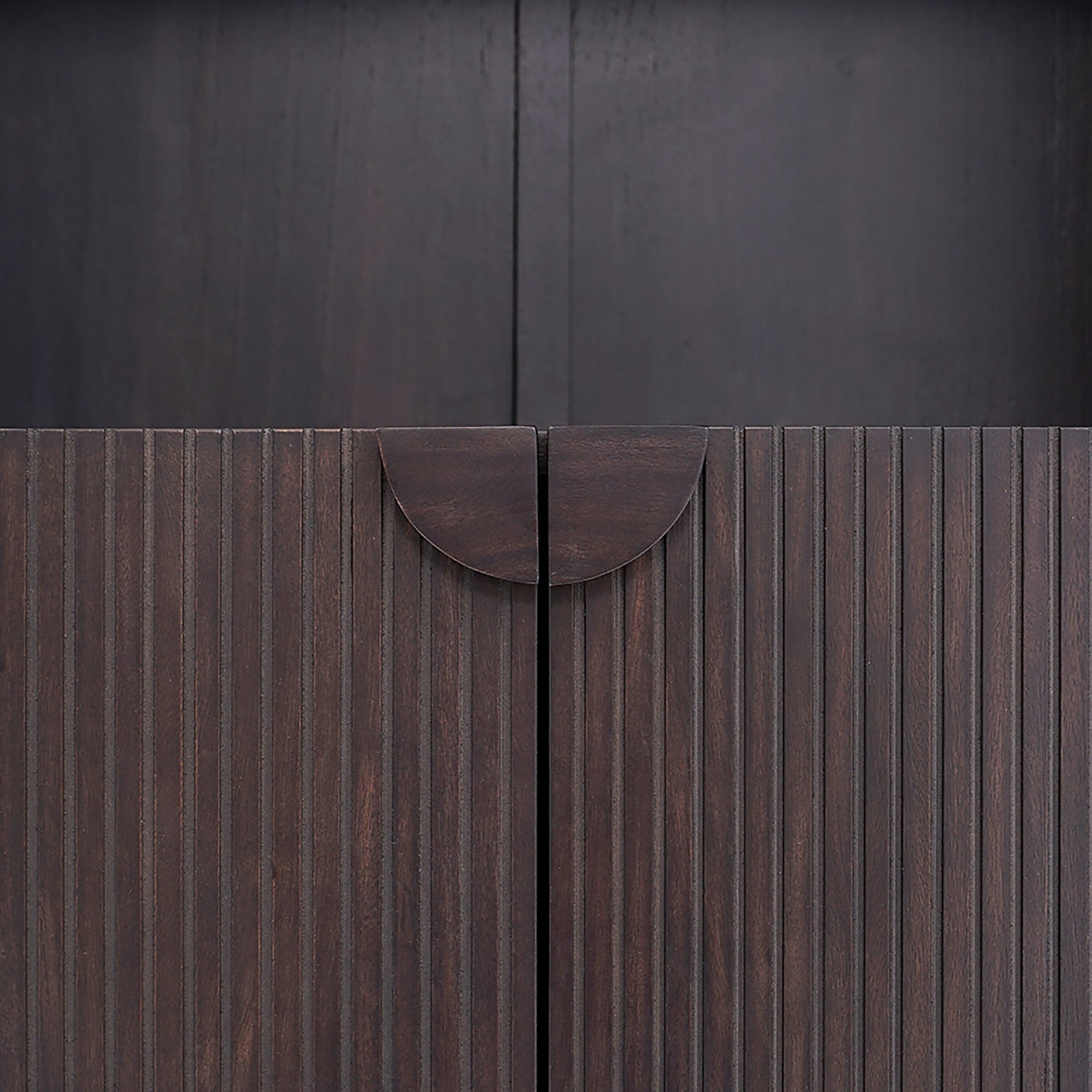 Close-up of a wooden door with a dark finish Javon Black