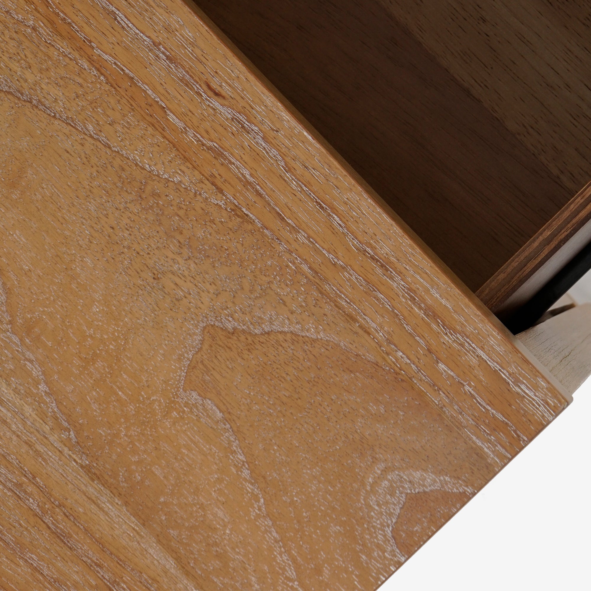 Close-up of a wooden surface with a visible grain pattern