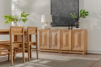 Natural Averi Modular Cabinet with chairs and a sideboard in a room with a television and plants.