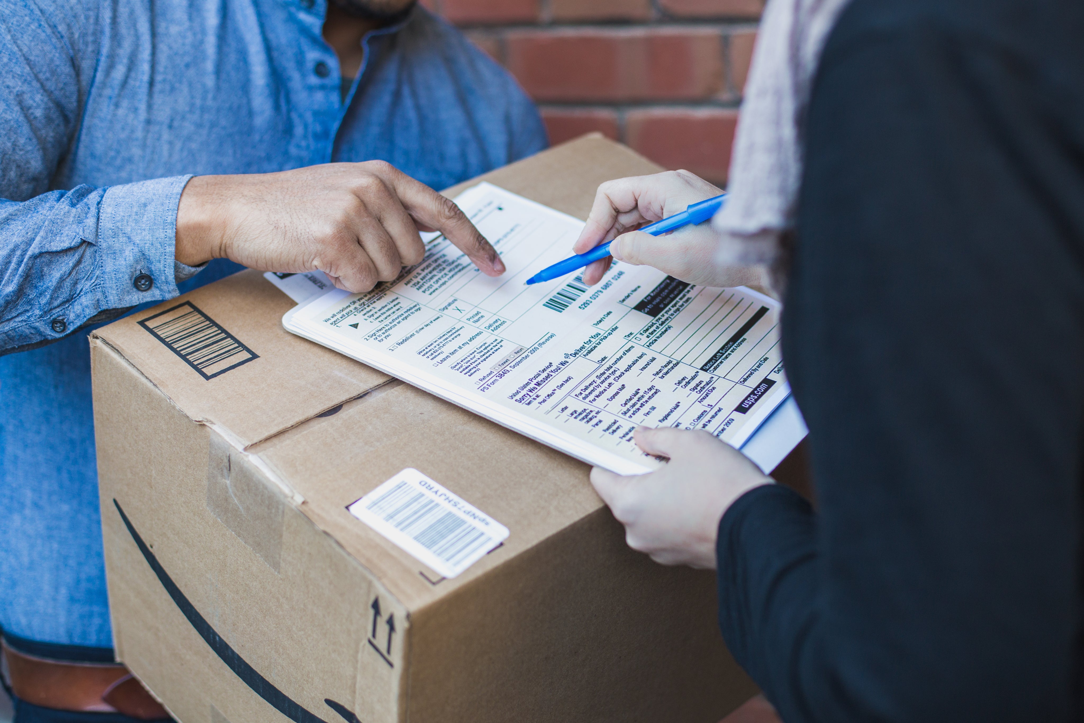 signing-shipping-forms-for-large-box.jpg